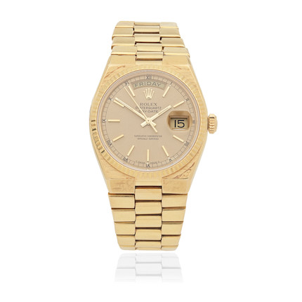 Bonhams : Rolex. An 18K gold quartz calendar bracelet watch ...