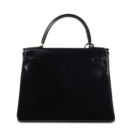 Bonhams : Hermès a Black Box Leather Retourne Kelly 28 1979 (includes ...