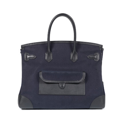 Bonhams : Hermès a Bleu Marine Toile and Black Swift Leather Cargo 35 ...