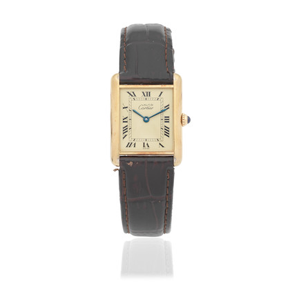 Bonhams : Cartier. A silver gold plated quartz wristwatch Tank, Must de ...