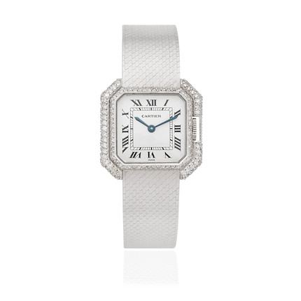 Bonhams : Cartier. A lady's 18K white gold diamond set manual wind ...