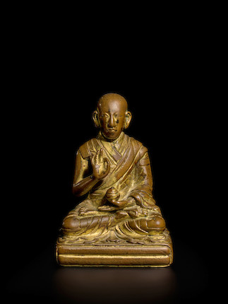 A GILT COPPER ALLOY FIGURE OF THE SECOND PANCHEN LAMA, LOBSANG YESHE PELZANGPO TIBET, CIRCA 18TH CENTURY image 1