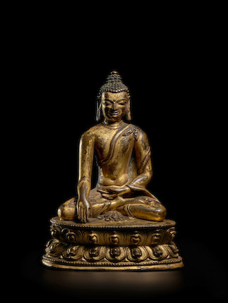 A GILT COPPER ALLOY FIGURE OF BUDDHA  TIBET, 13TH/14TH CENTURY image 1