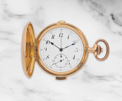Montre de gousset à clapet en or jaune 18K (750) chronographe à répétition des quarts remontoir au pendant An 18K gold keyless wind quarter repeating chronograph full hunter pocket watch Circa 1900 image 1
