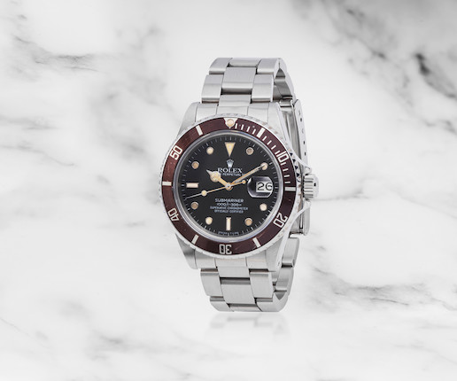 Rolex. Montre bracelet en acier avec date mouvement automatique Rolex. A stainless steel automatic calendar bracelet watch   Submariner Date, Ref 16800, Circa 1986 image 1