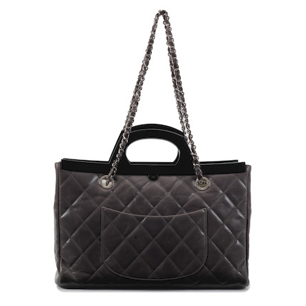 Sold at Auction: A Chanel 19 Maxi Grey Leather Flap Bag.