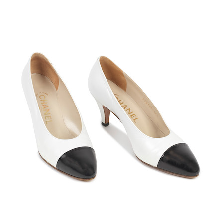 Bonhams : Chanel a Pair of Black and White Two-tone Pumps (includes dust  bags and box)