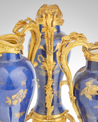An important garniture of three Louis XV ormolu mounted Chinese powder-blue and gilt porcelain vases The porcelain Kangxi (1654-1722), the mounts mid-18th century (3) image 4