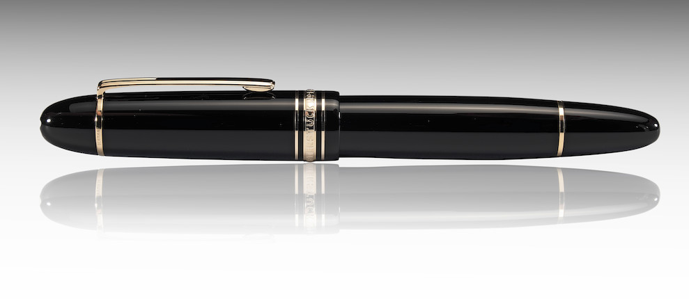 A Montblanc Meisterstück 149 black and gold fountain pen and ink set (2) image 6