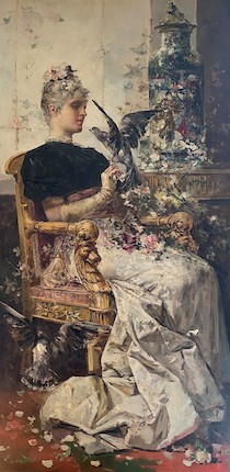 Salvador Sánchez Barbudo (Spanish, 1857-1917) An elegant lady seated in an interior image 1