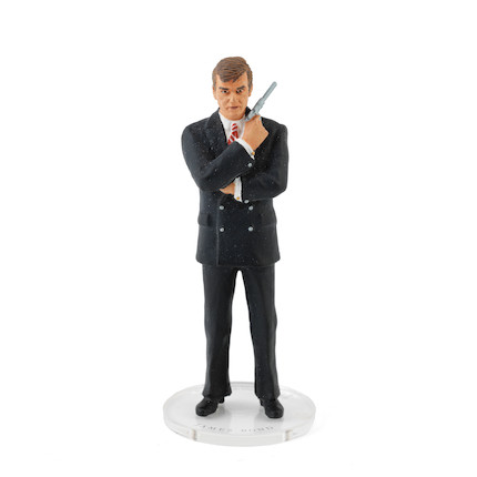 Bonhams : A Corgi 'icon' figure of Sir Roger Moore as James Bond, and ...