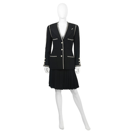 Bonhams : Chanel a Black Wool Skirt Suit with Camellia Details