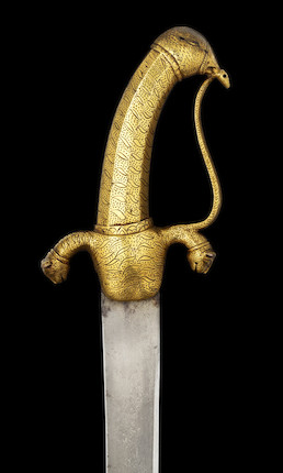Bonhams : A gold damascened steel and wood staff Gupti with tiger head  forte Rajasthan, late 18th Century(2)