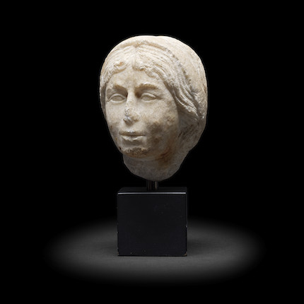 Bonhams : A marble head of an Italian woman Probably 15th Century