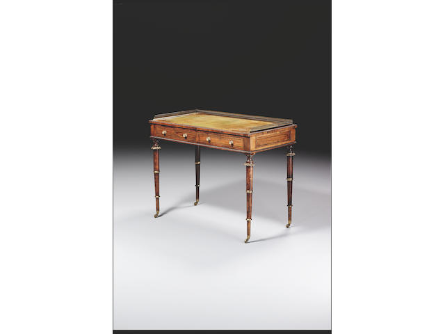 A Regency rosewood and brass inlaid Writing Desk, in the manner of John McLean,