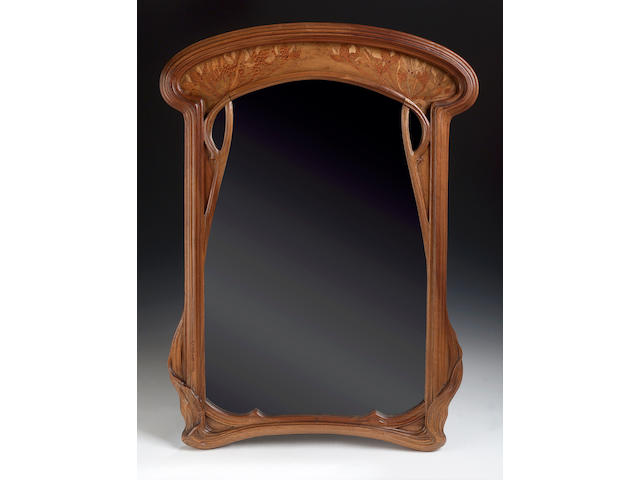 Emille Galle, A marquetry wall mnirror, 74cms high, carved signature 'Galle'
