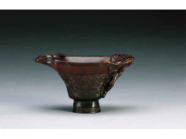 An elegant rhinoceros-horn libation cup,