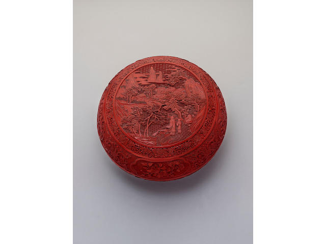 A cinnabar lacquer circular box and cover,