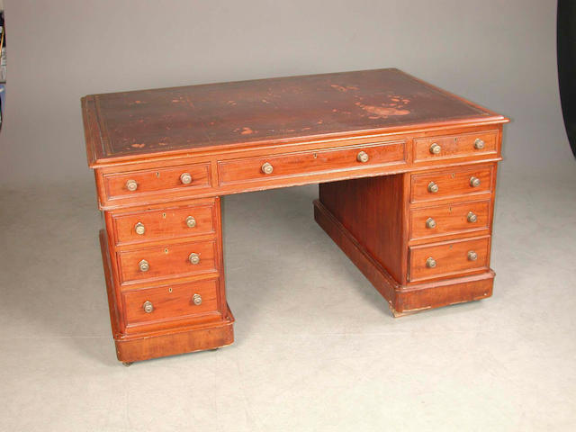 A late Victorian mahogany partners pedestal desk 154cm. wide, 106cm. deep, 79cm. high