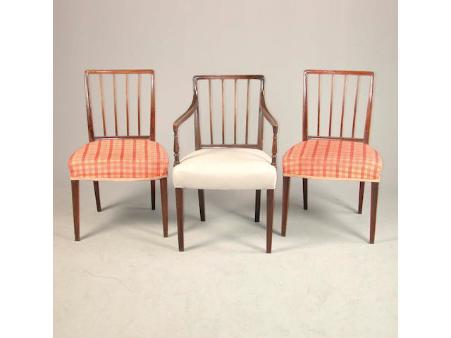 A set of six late George III mahogany dinning chairs including a pair of open armchairs