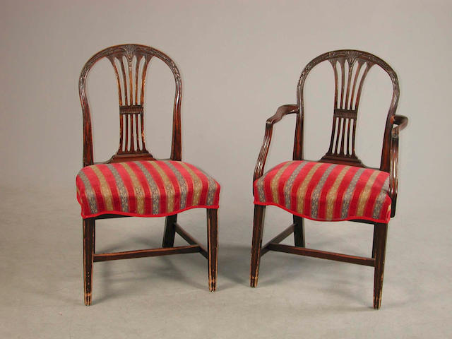 A set of eight mahogany dining chairs,  in the Hepplewhite style,