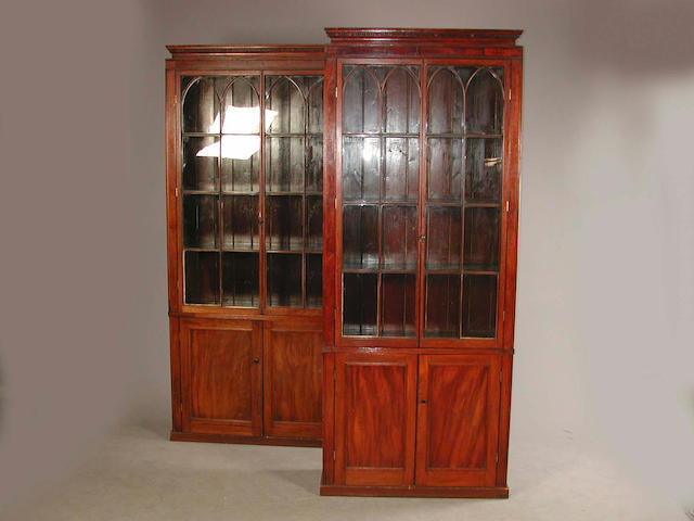 Two matching mahogany bookcases in the Regency style