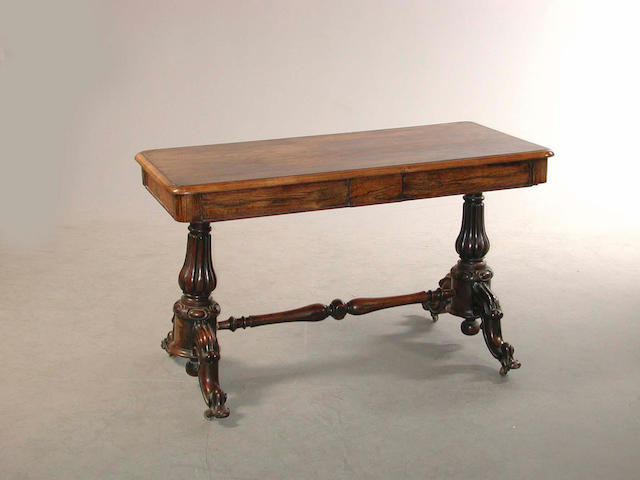 A Victorian rosewood library table 121 cm. wide x 60 cm. deep x 73 cm. high