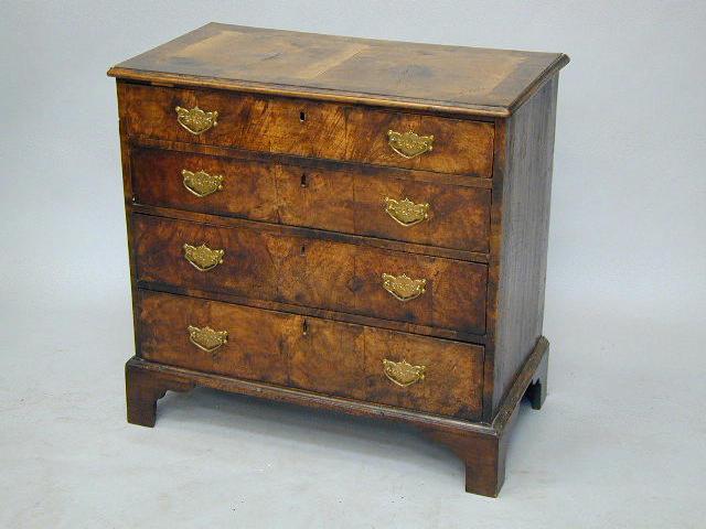 An 18th Century walnut and crossbanded chest,