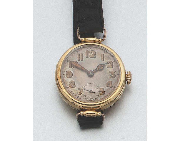 Rolex. An 18ct gold wristwatch with hinged wire lugs Case No.974557 35mm