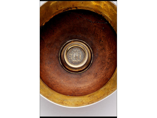 A late 15th Century silver-gilt mounted maple wood mazer bowl, unmarked, circa 1480,