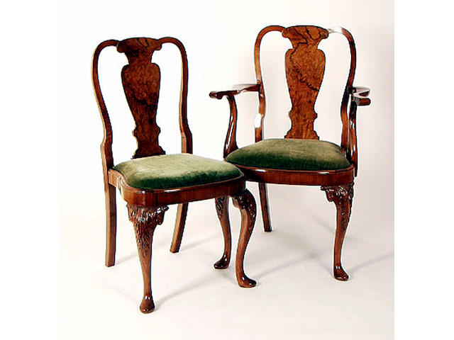 A 20th Century walnut dining suite, table 246cm fully extended. See Illustration.