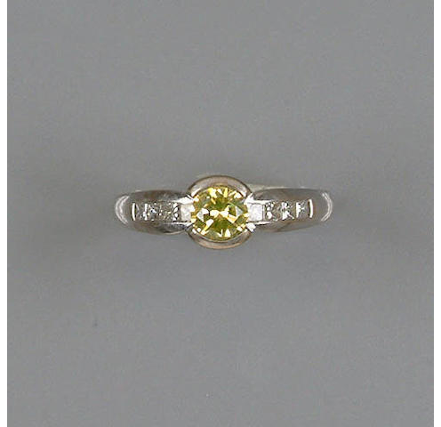 An irradiated diamond single-stone ring