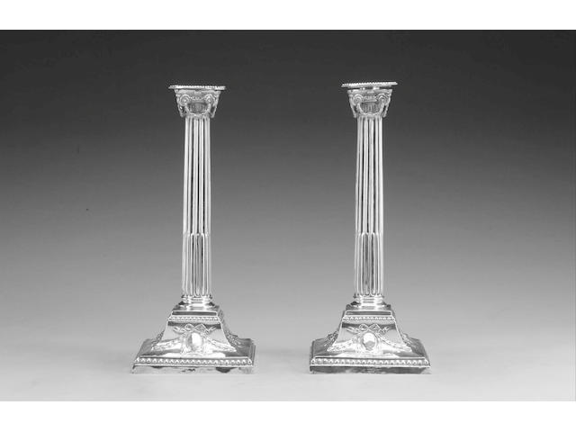 A pair of Victorian silver Ionic column candlesticks, by Rupert Favell & Henry Elliot, London 1888,