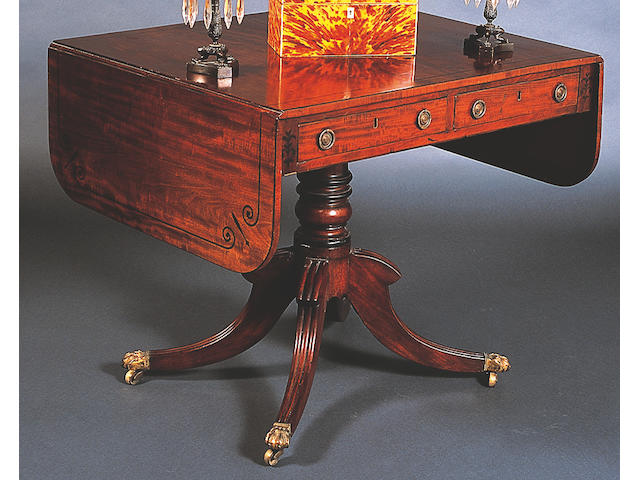 A George IV mahogany and ebony line inlaid sofa table,