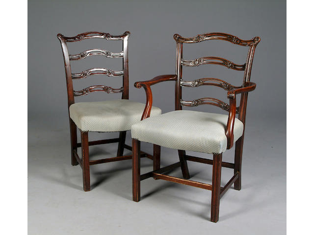 A matched set of twelve George III style mahogany ladder back dining chairs