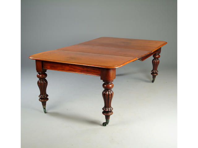 An early Victorian mahogany dining table