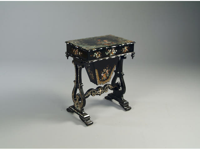 A Victorian papier mache work table