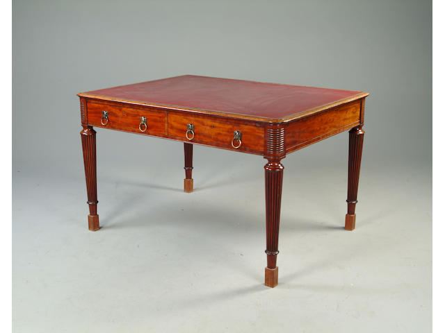 A Regency mahogany partners library table