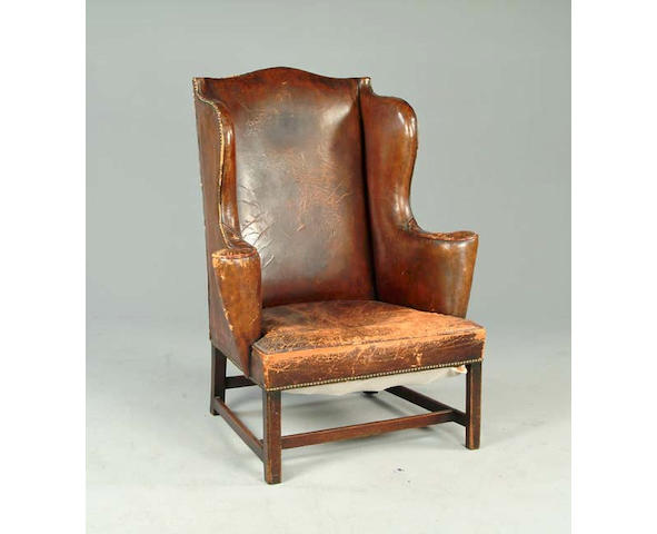 A George III wing back armchair