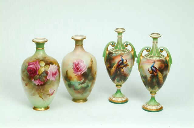 A pair of Royal Worcester James Hadley vases