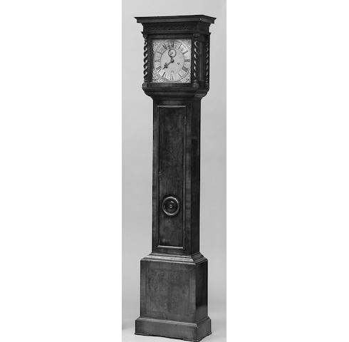 Joshua Travis,An 18th century walnut cased longcase clock