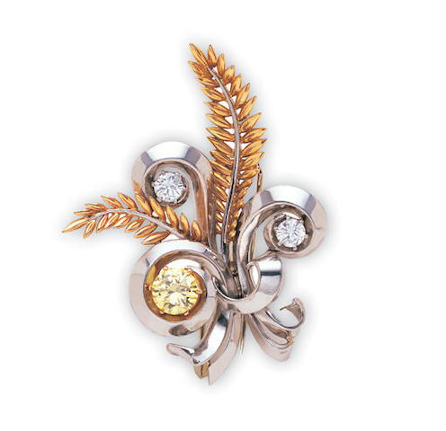A yellow diamond and diamond brooch by Boucheron