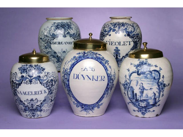 A mid 18th Century Dutch Delft painted tobacco jar,