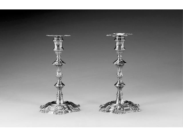 A pair of George II silver cast candlesticks, by James Morison, London 1758,