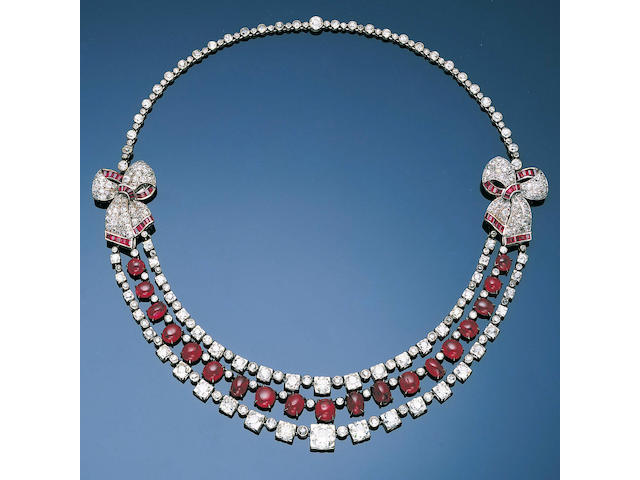 An art deco ruby and diamond festoon necklace