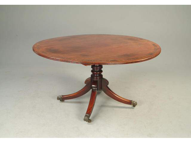 A George III style mahogany and rosewood banded breakfast table