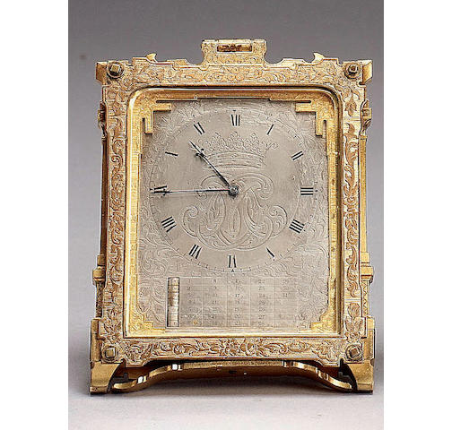 A mid 19th century gilt brass calendar strut timepiece in the manner of Thomas Cole Signed on the regulation cover "C.F.HANCOCK a successor of STORR & MORTIMER'S By Appointment to HM. the QUEEN ADELAIDE, HIM the EMPEROR of RUSSIA 39 Bruton St, LONDON"
