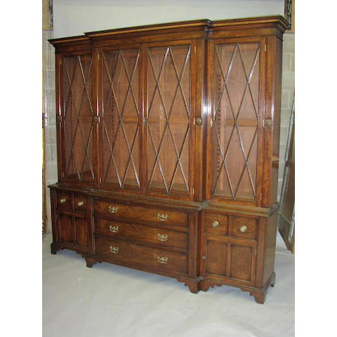 A mahogany breakfront bookcase,
