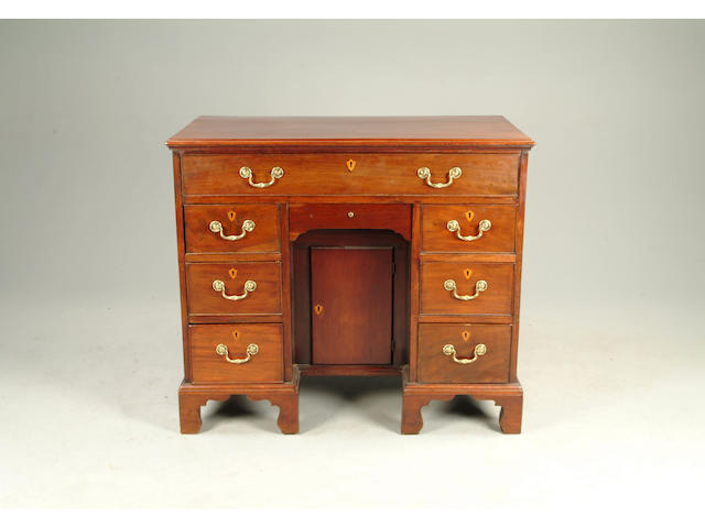 A mahogany kneehole desk
