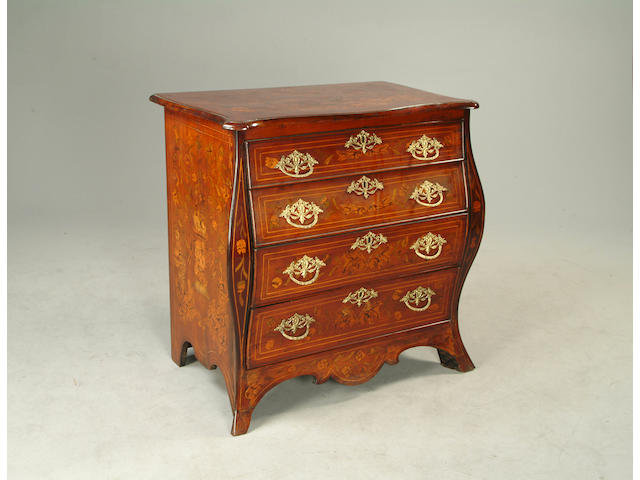 A 18th century Dutch mahogany and floral marquetry bombe commode